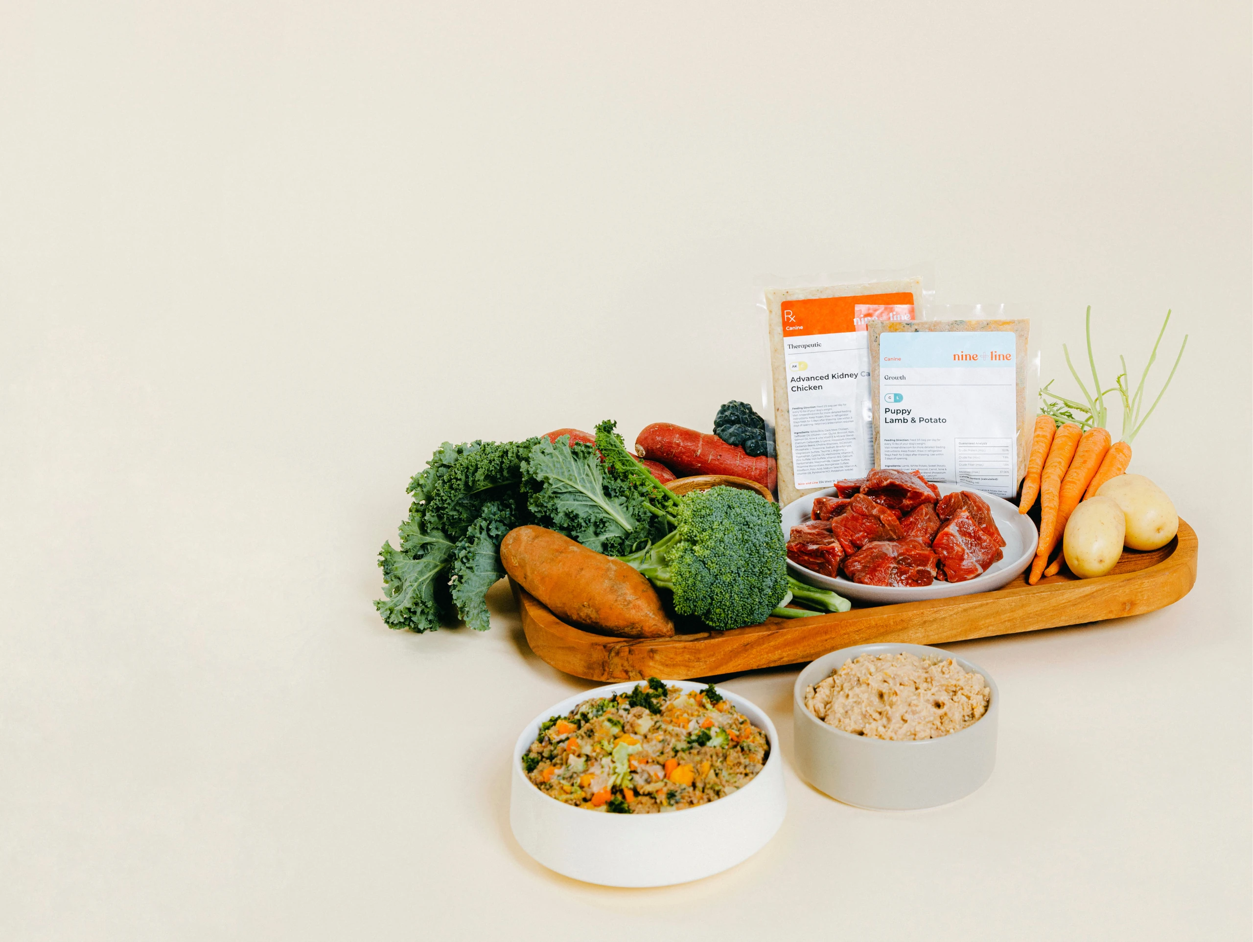 Nine & Line meals surrounded by fresh ingredients